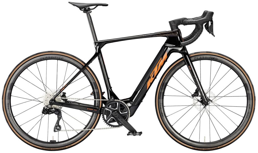 Elektriskais velosipēds KTM MACINA REVELATOR SX PRIMEcarbon (orange+black matt)